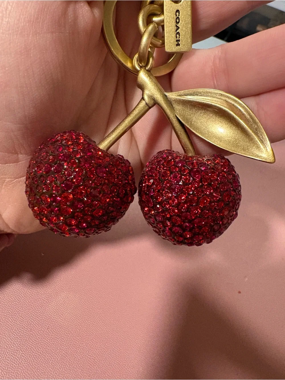 Coach Gold-Tone Cherry Charm Keychain with Red Crystals